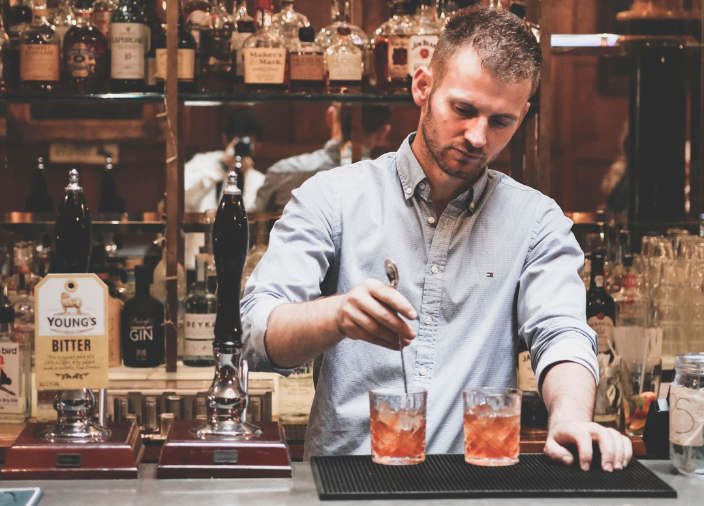   Bartender preparing cocktails 