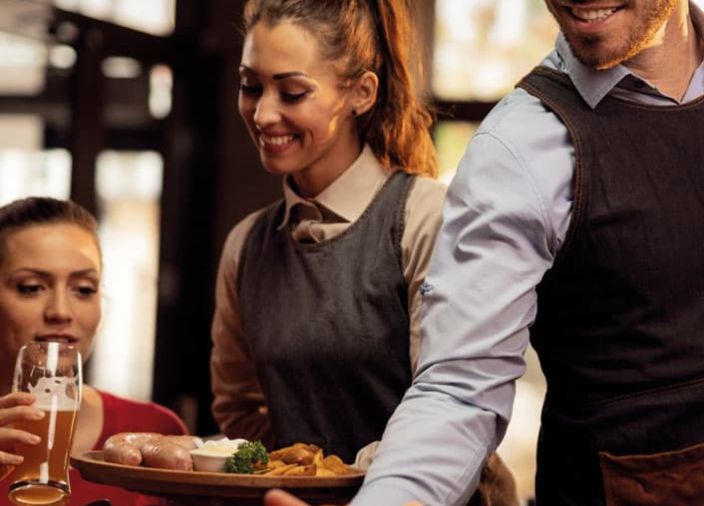 server bring food to the table