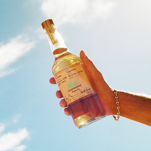 Cocktail bottle in hand
