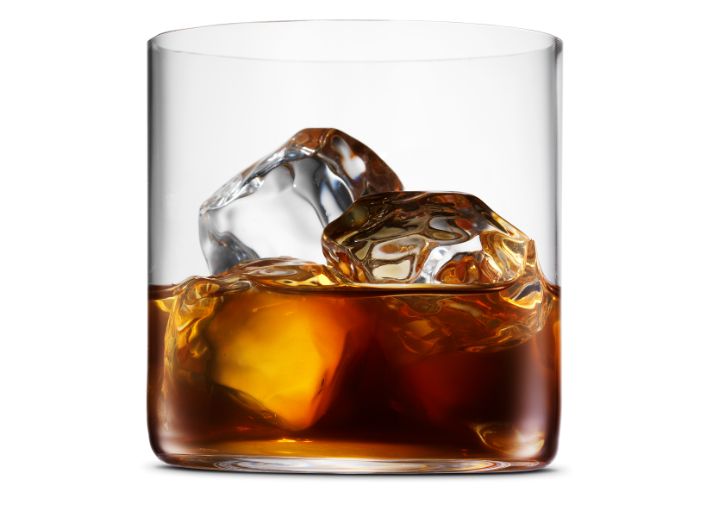 Glass of coffee liqueur with ice.