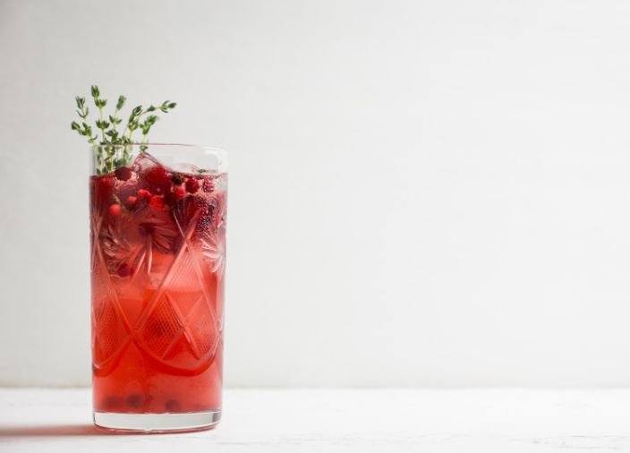 Cranberry highball garnished with berries