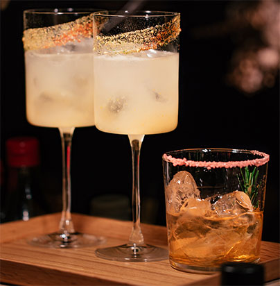 Three cocktails waiting to be served 