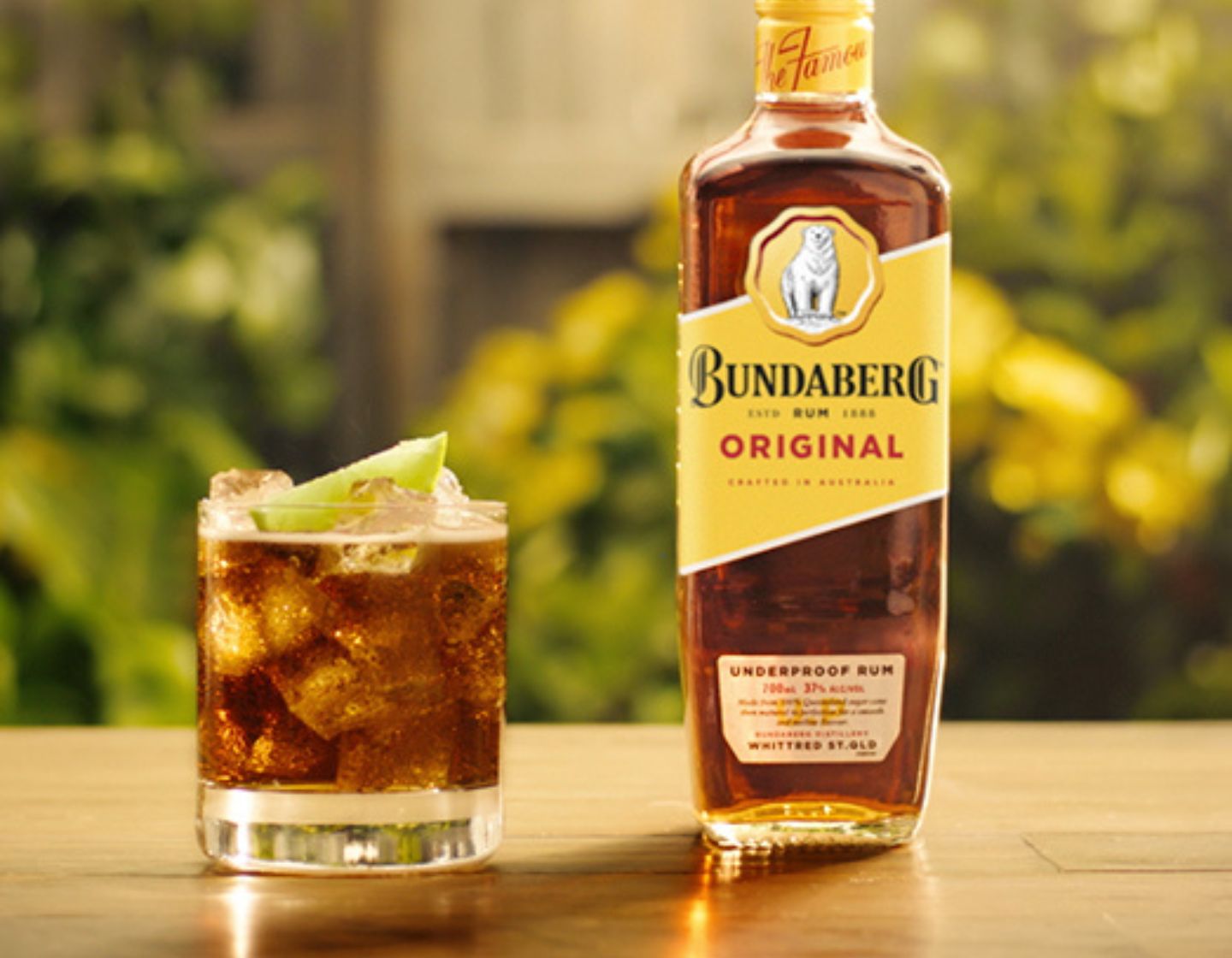 Rum bottle with a rum cocktail.