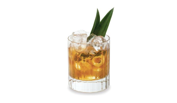 Two Cloud Topper cocktails with foam next to Zacapa bottle