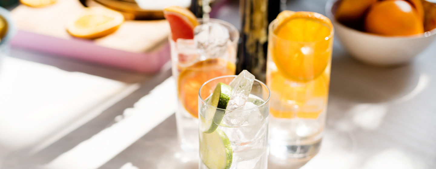 three cocktails on a table