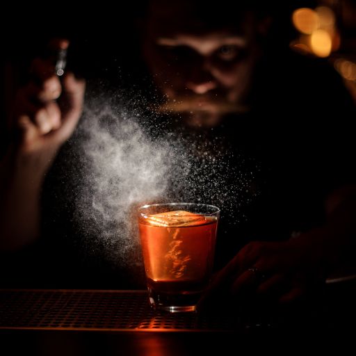 Orange cocktail with vapour 