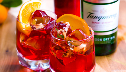 Tanqueray Negroni Cocktail served in a glass with garnish 