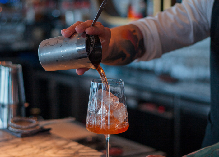 Bartender pouring drink