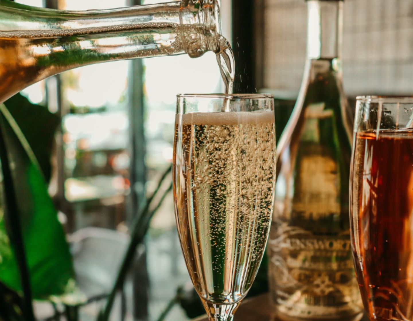 Champagne flute being poured