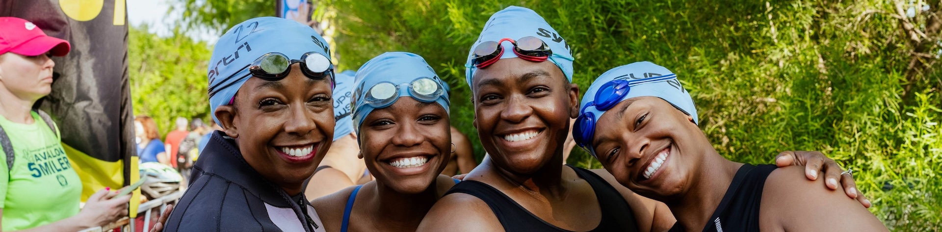 Supertri Triathletes showing off their swim gear