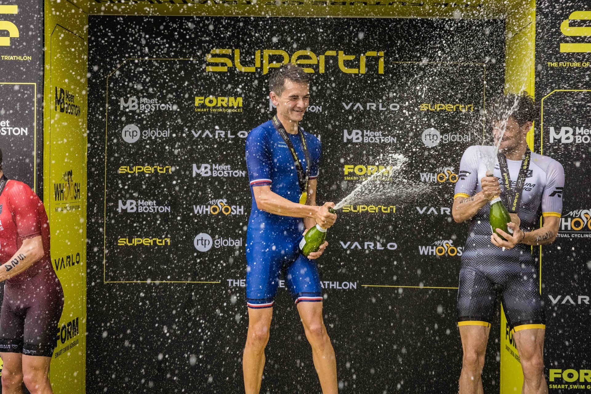 Alex Yee on the podium at supertri Boston
