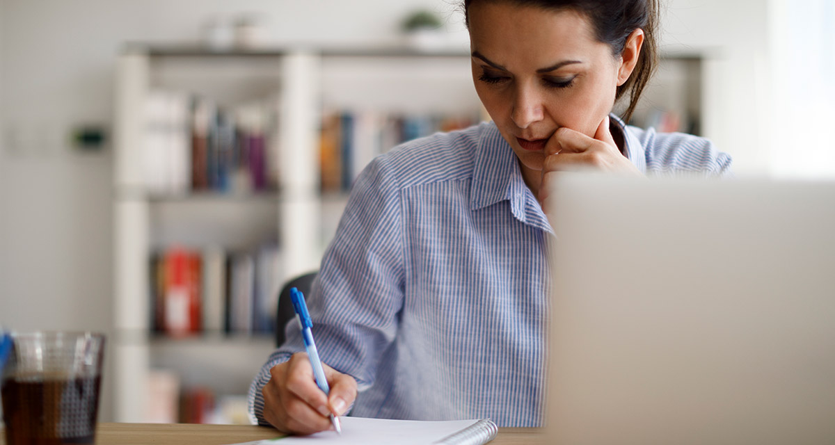 A nurse in an office submitting a PA request