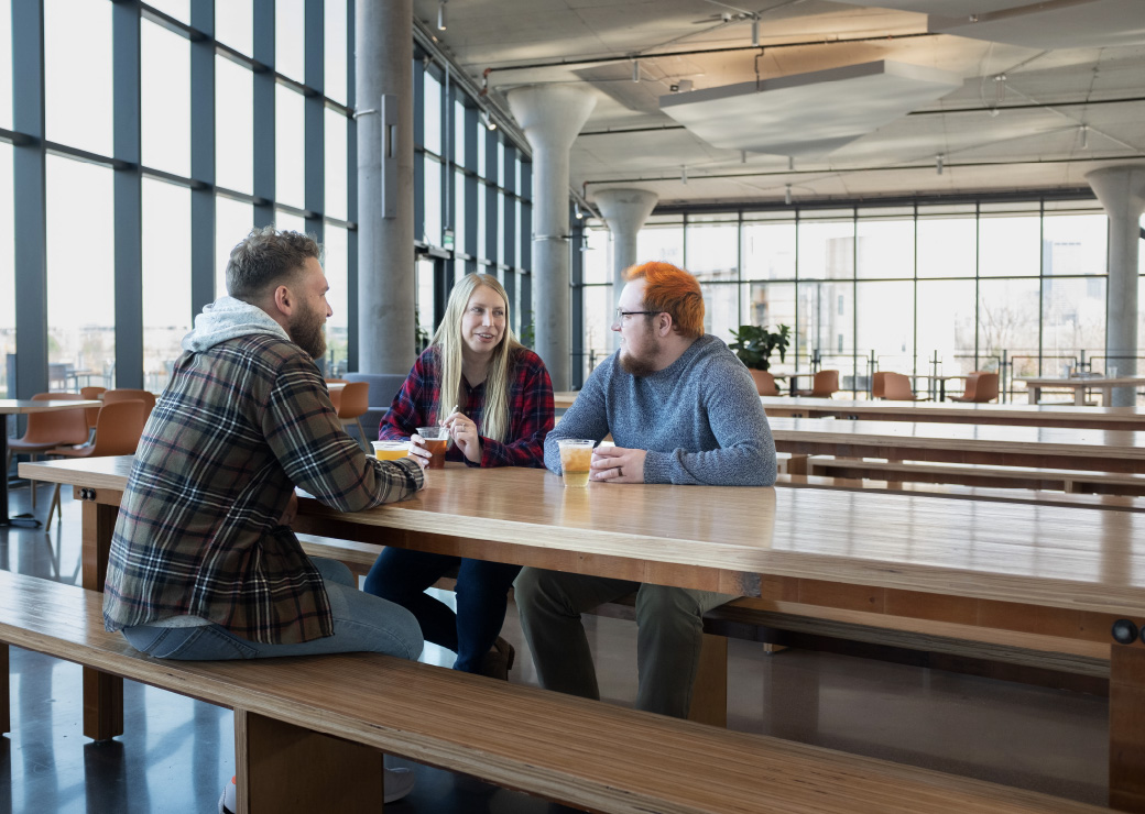 Employees sitting at a lunch table at CoverMyMeds