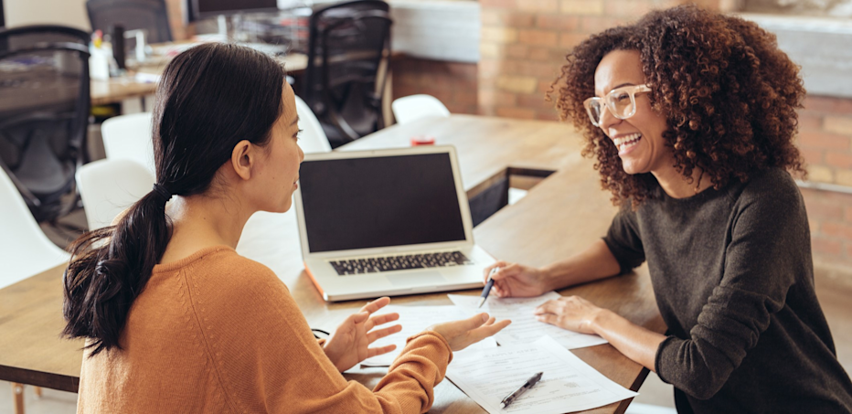 Two work colleagues having a discussion