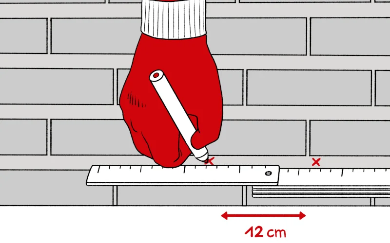 Grafik wo Handwerker Bohrlöcher für Horizontalsperren-Sticks mit Zollstock anzeichnet