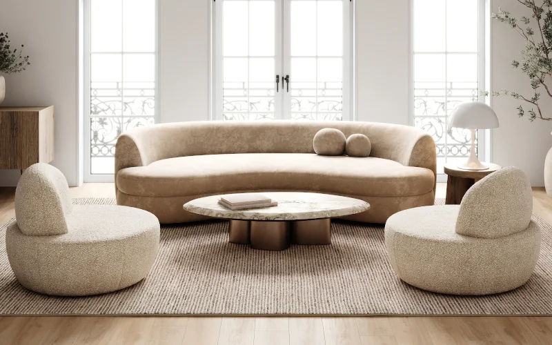 Wohnzimmer mit runden Sitzmöbeln, rundem Tisch und Holzboden