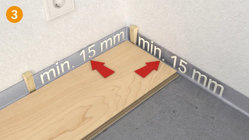 Laminatverlegung mit Abstandshaltern, mindestens 15 mm Abstand.