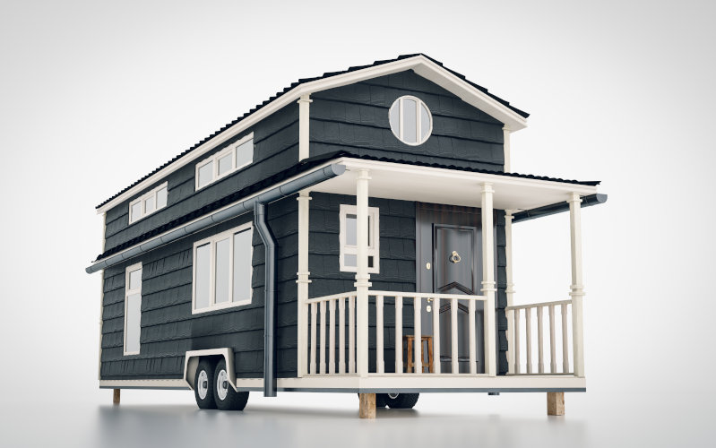 Graues Tiny House auf Rädern