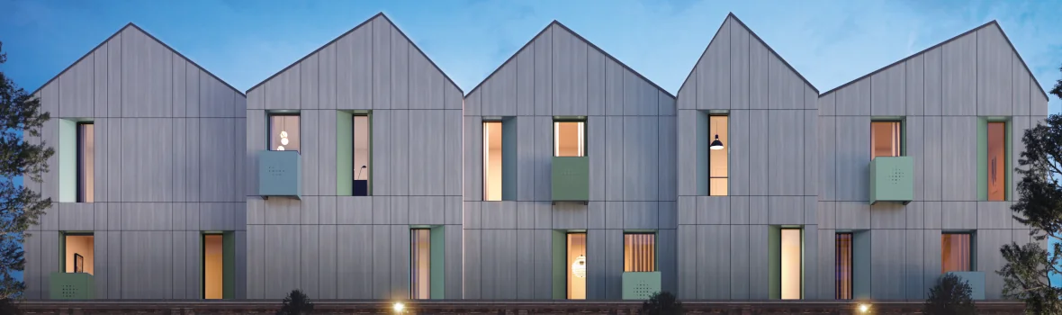 Reihenhaus mit moderner Fassade aus grauen Fassadenplatten