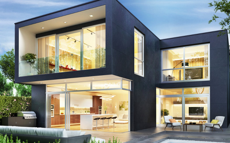Modernes Haus mit dunkler Fassade und Glasfronten