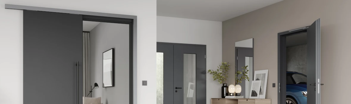 Wohnraum mit mit Kommode und Spiegel und geöffneter Tür zur Garage.