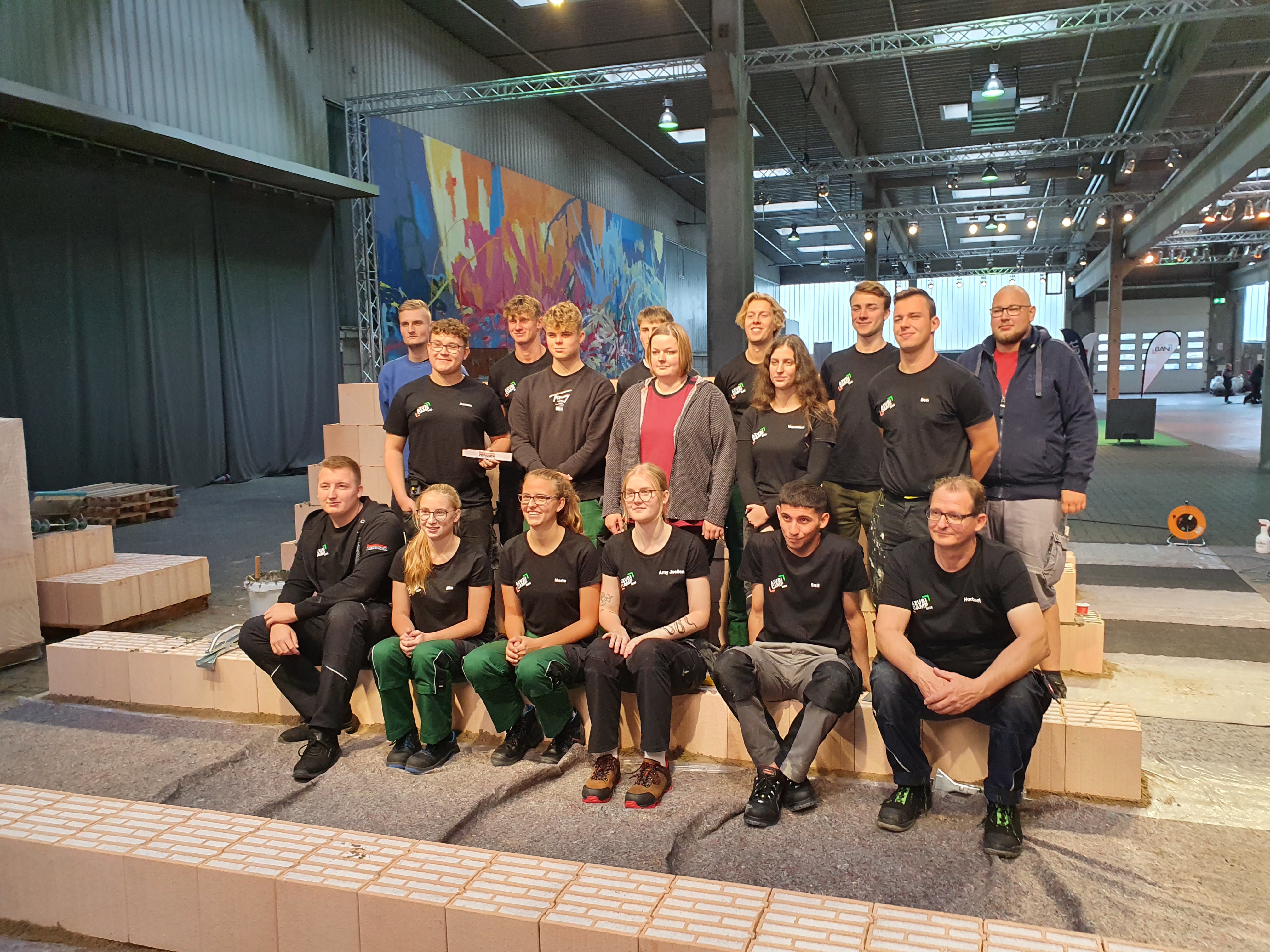 Menschen machen Gruppenfoto