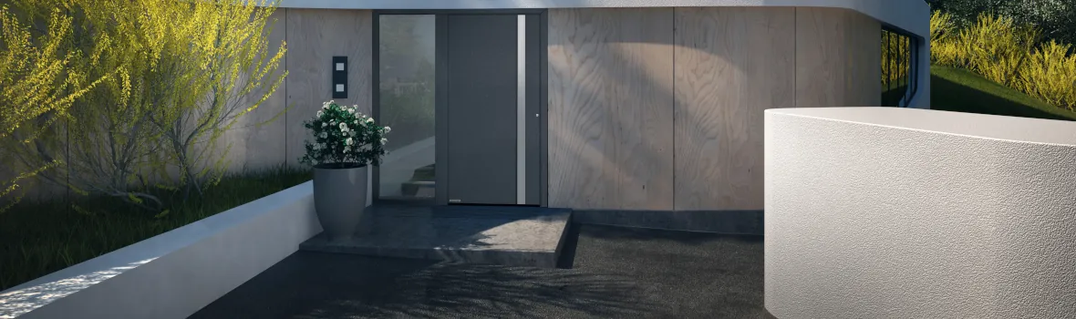 Eine eingebaute dunkle Haustür und einem modernen Eingangsbereich.