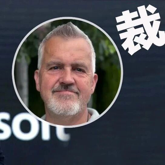 Middle-aged tech worker leaving a modern office with a box of belongings, symbolizing AI-era layoffs