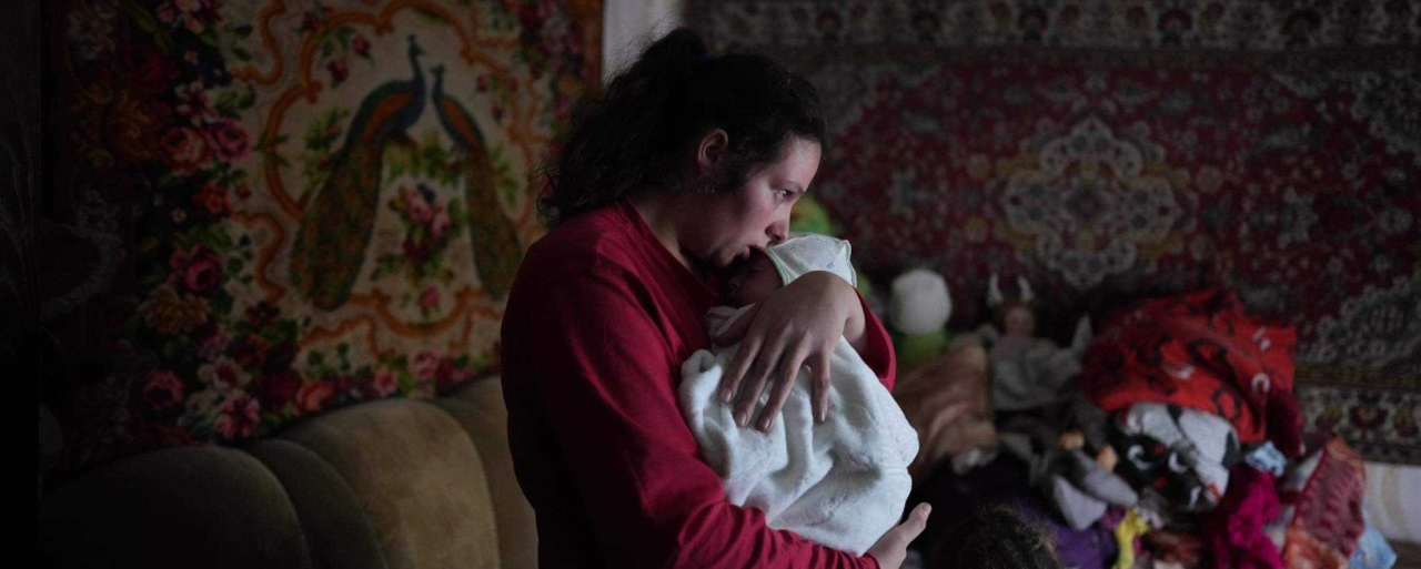 Українська сім’я під час війни. Джерело: Євгеній Малолєтка / AP Photo