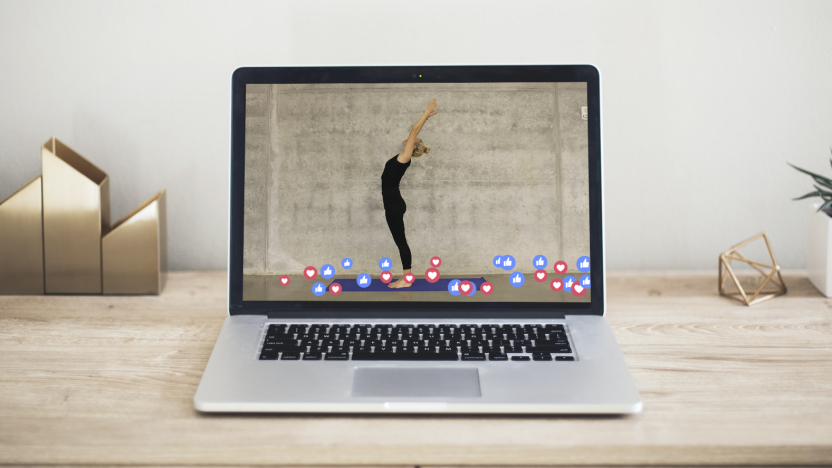 Photo of a laptop display showing an online yoga class