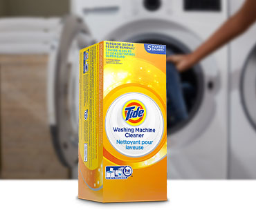 Tide Washing Machine Cleaner in front of a washing machine