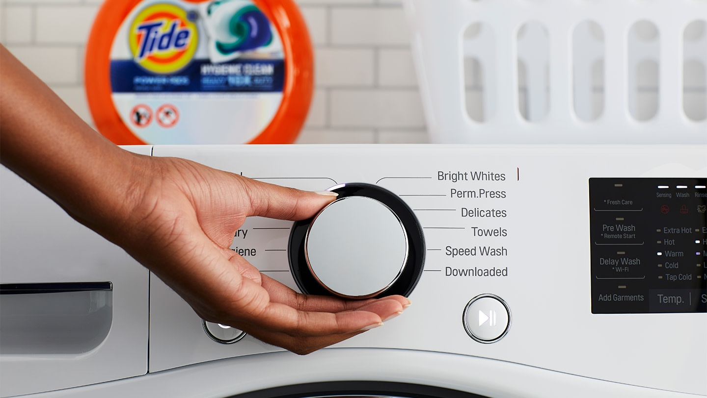 Select the wash cycle and water temperature on your washing machine