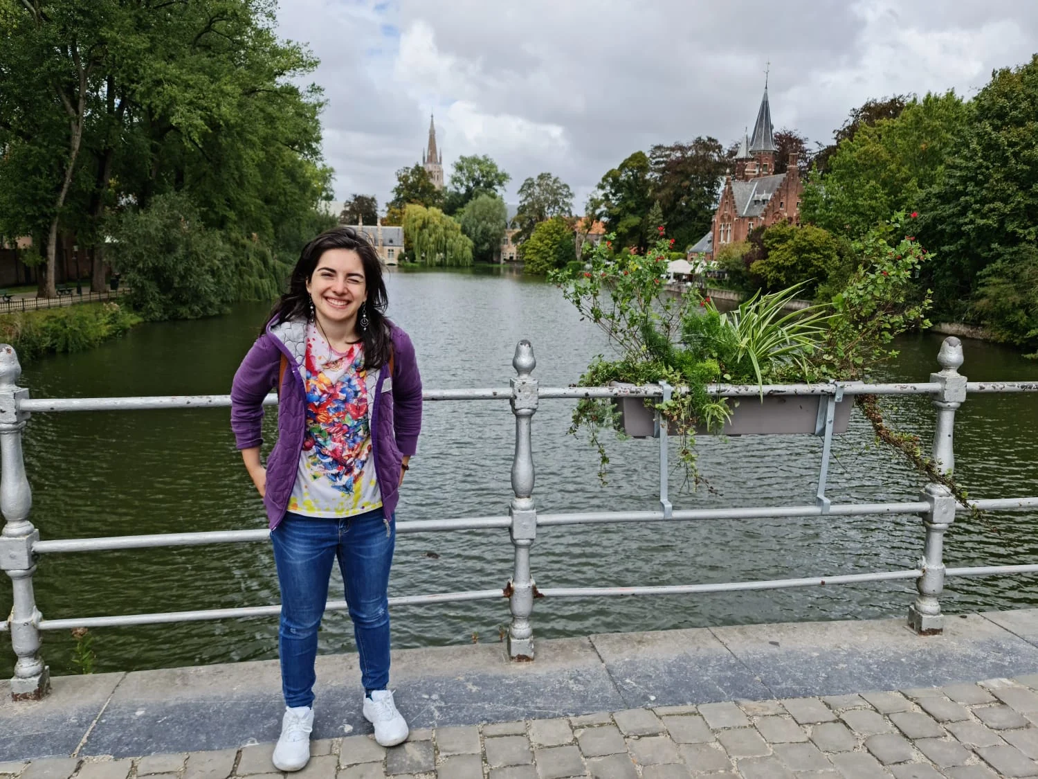 Rosa stands in front of a canal