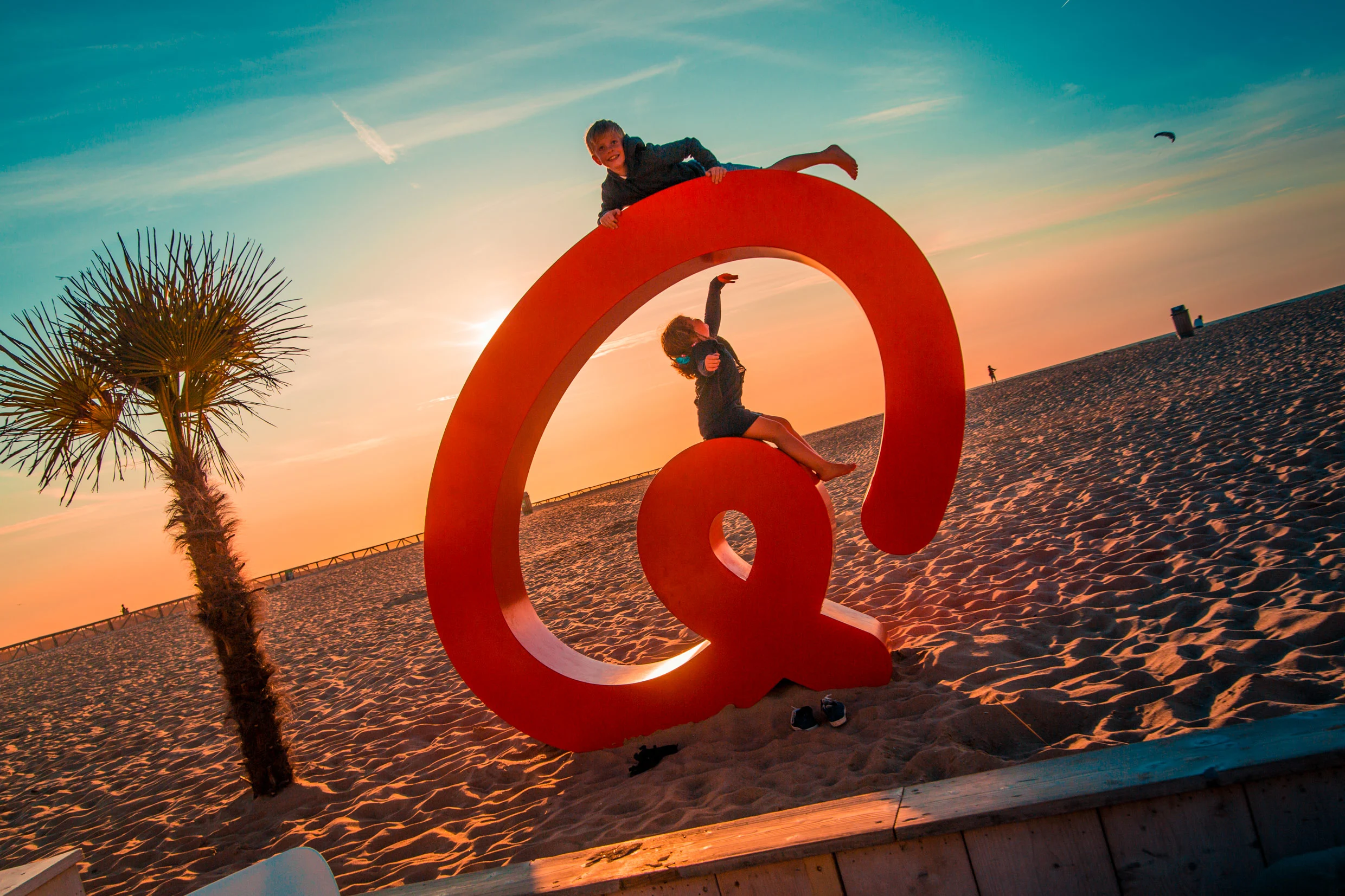 Q-logo bij het Q-Beach House