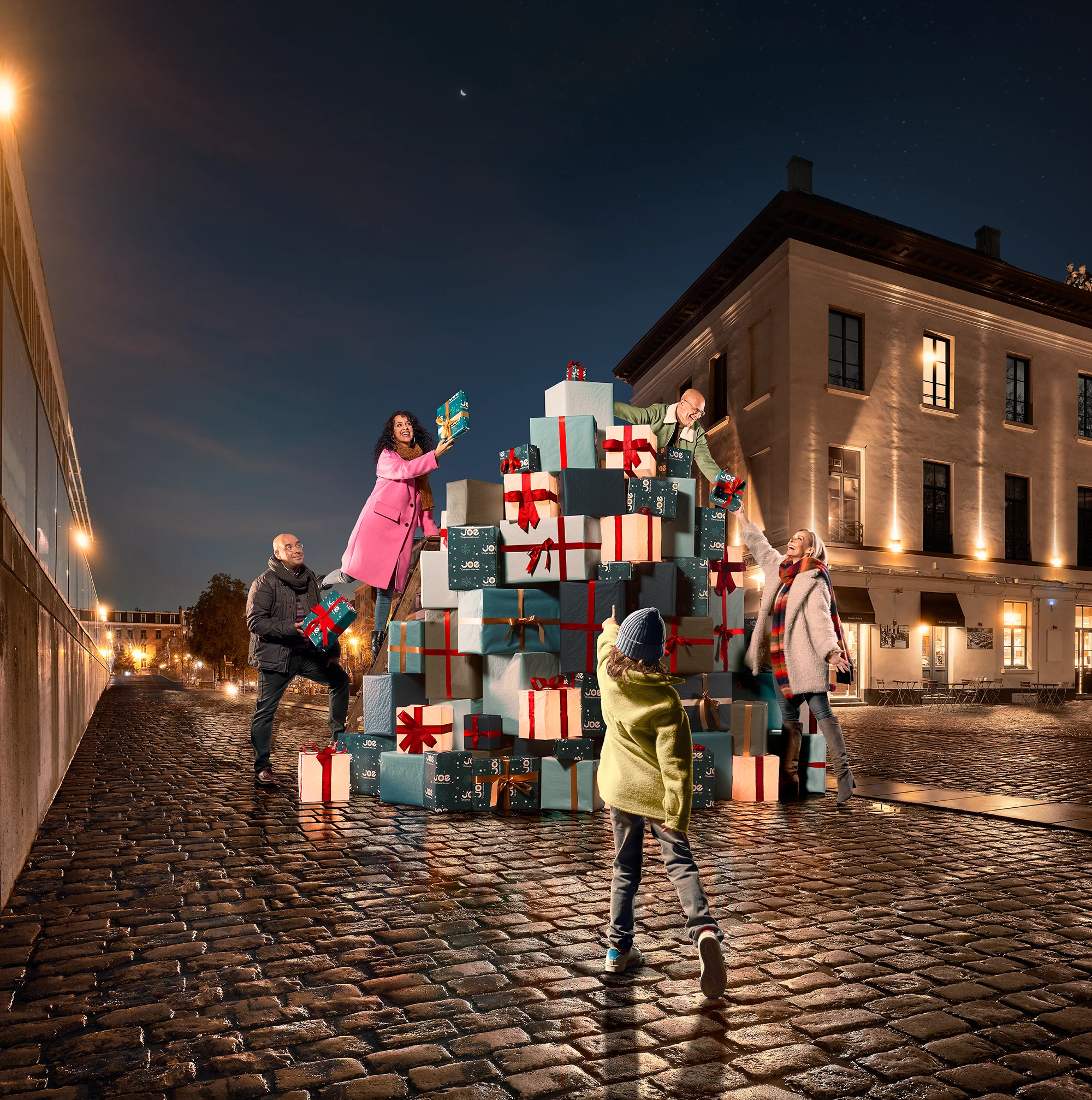 Joe presenters build tower with presents