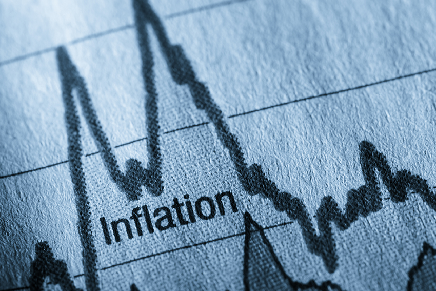 The word inflation written on paper line graph showing ups and downs of constrains