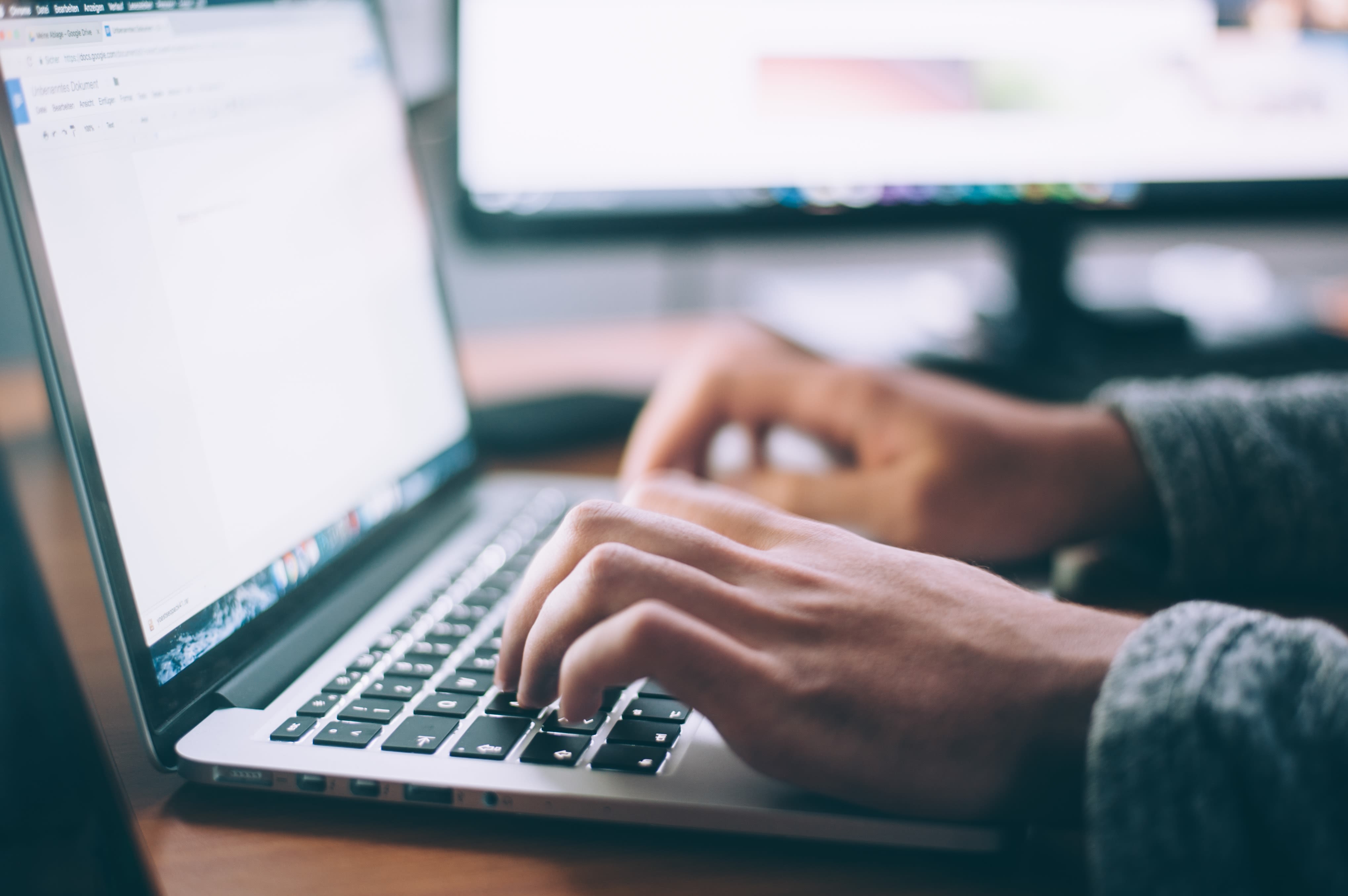 Photo of someone writing a blog. Credit goes to Glenn Carstens Peter on Unsplash.