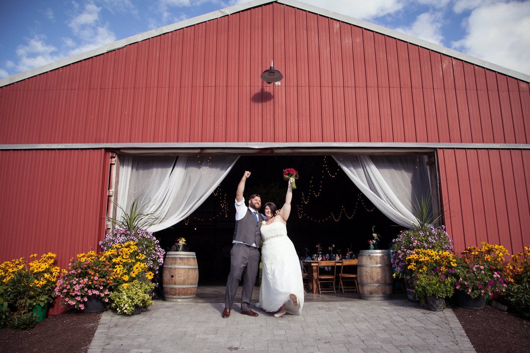 couple in  front of barn