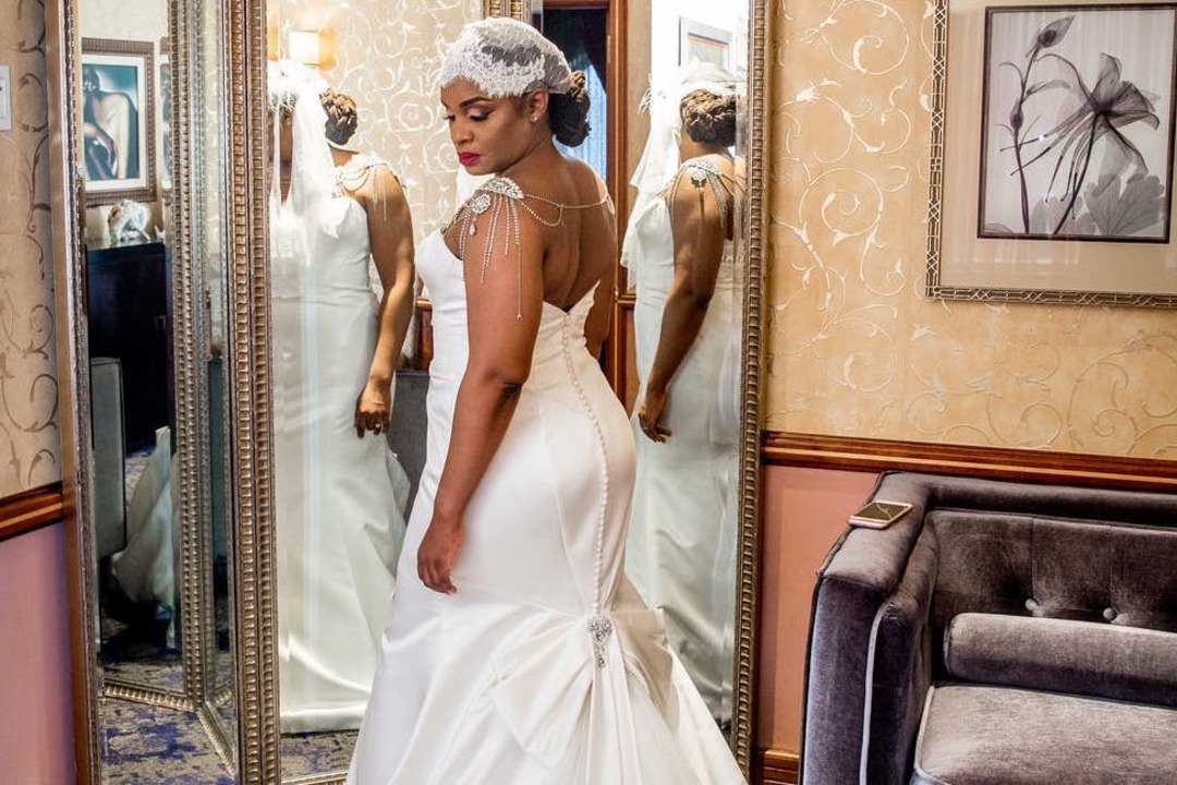 Flower Girl Hiding Under Wedding Dress - ALB Photography