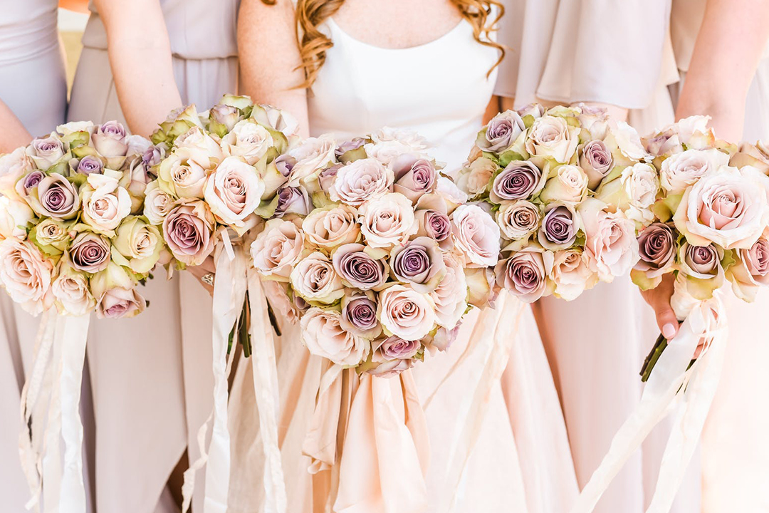Bridal party holding bouquets