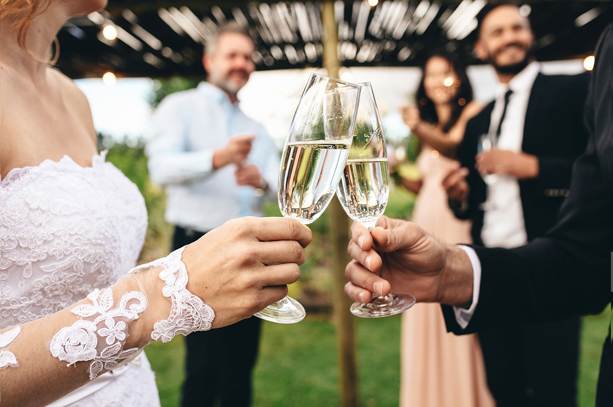 couple toasting with champagne glasses.