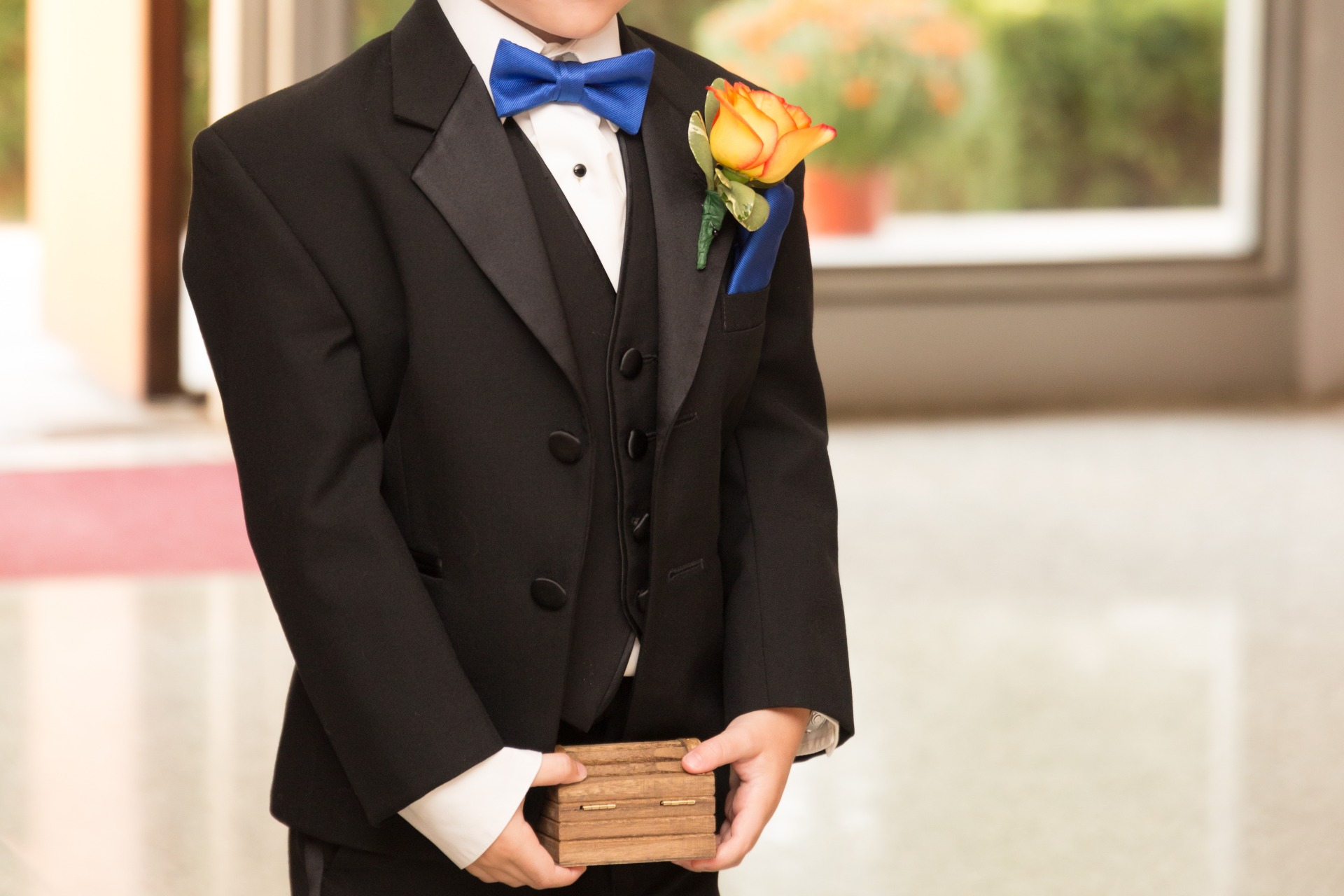 Ring Bearer Blowing Bubbles at Ceremony