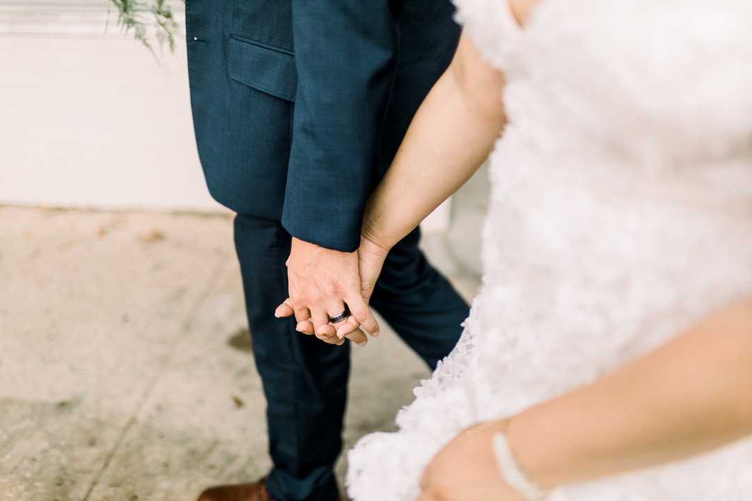 Newlyweds Holding Hands changing name surname