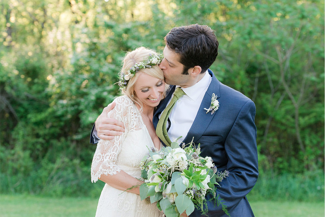 Couple with flowers in embrace