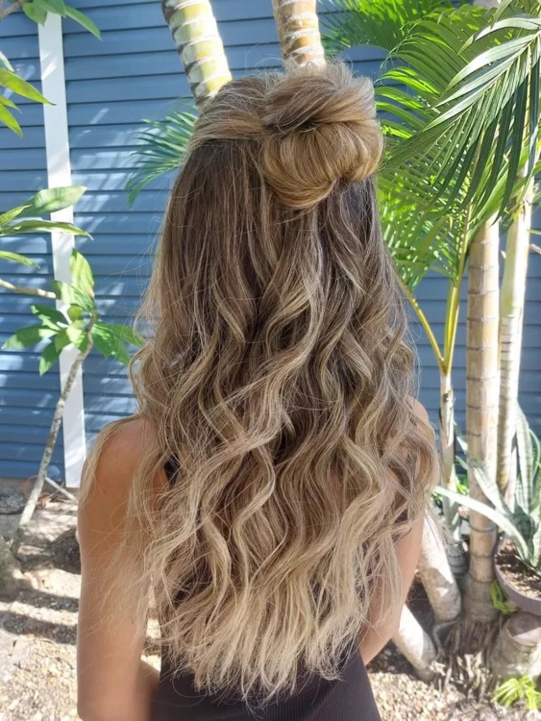 Loose Bun Half Up Half Down Hairstyle