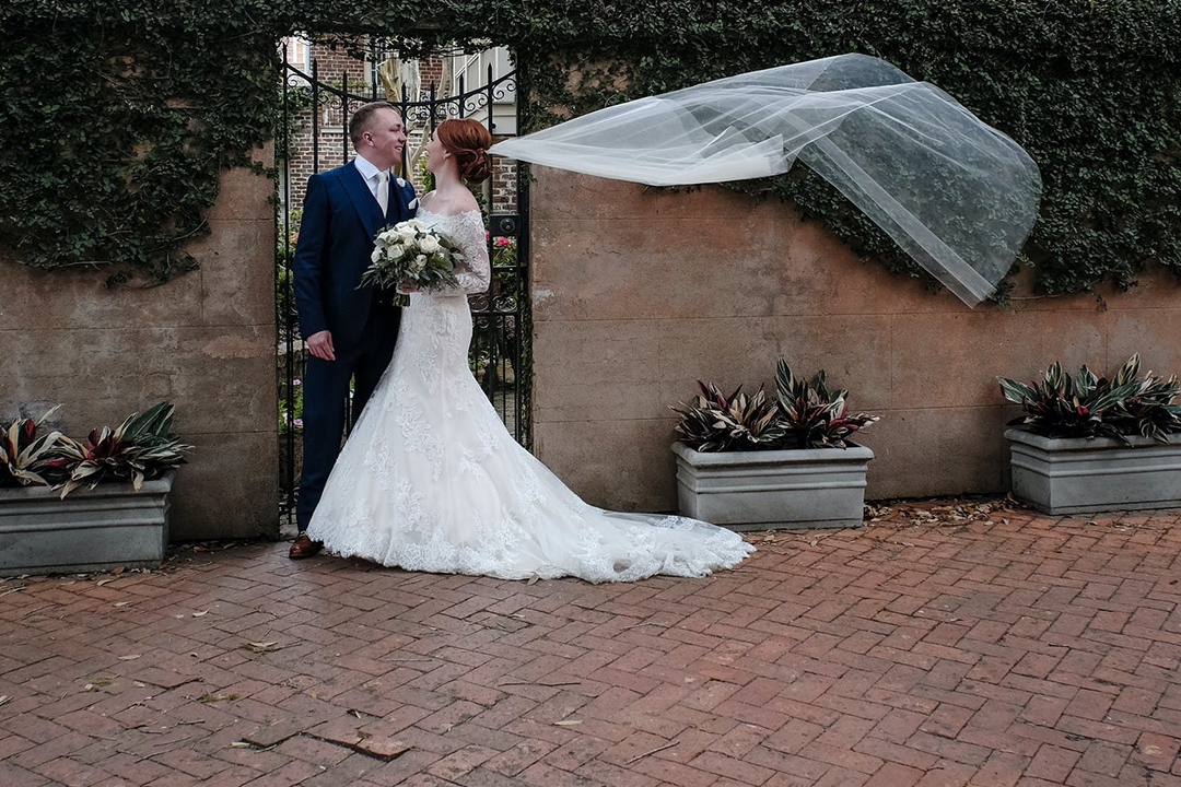 couple with flowing veil