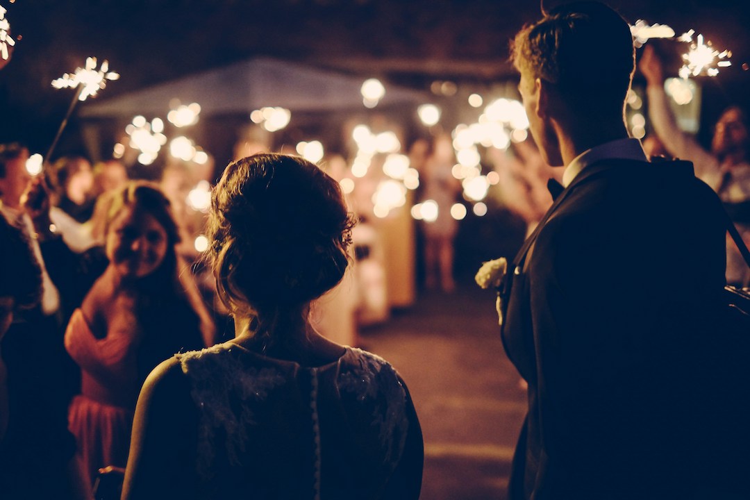 Wedding Sparklers by Andreas Ronningen on Unsplash
