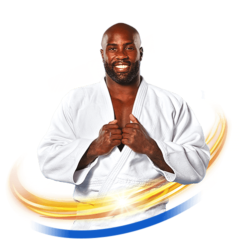 Teddy Riner souriant en kimono blanc