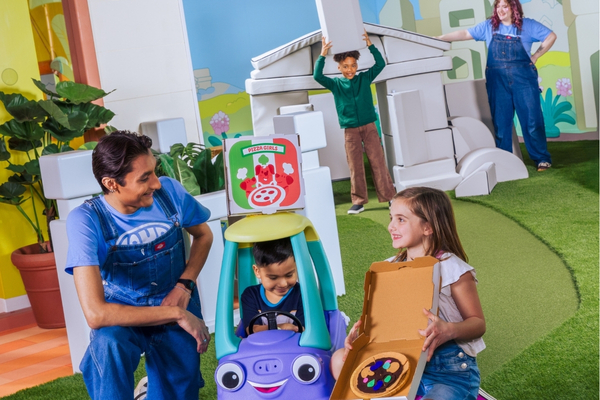 CAMP Counselor playing with child at Bluey X CAMP