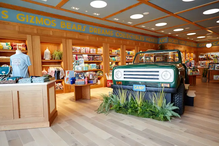 CAMP store with shelves of toys and gifts